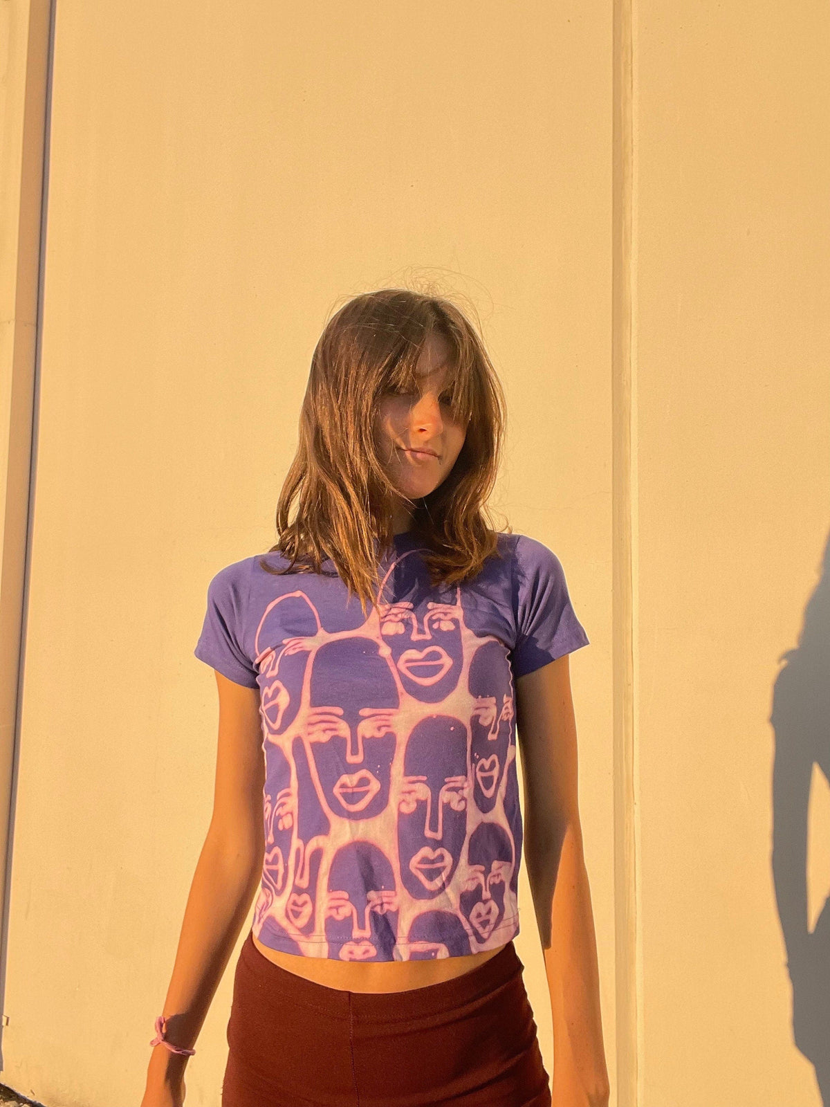 Various faces baby tees