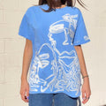 Pastel blue faces graphic oversized tee