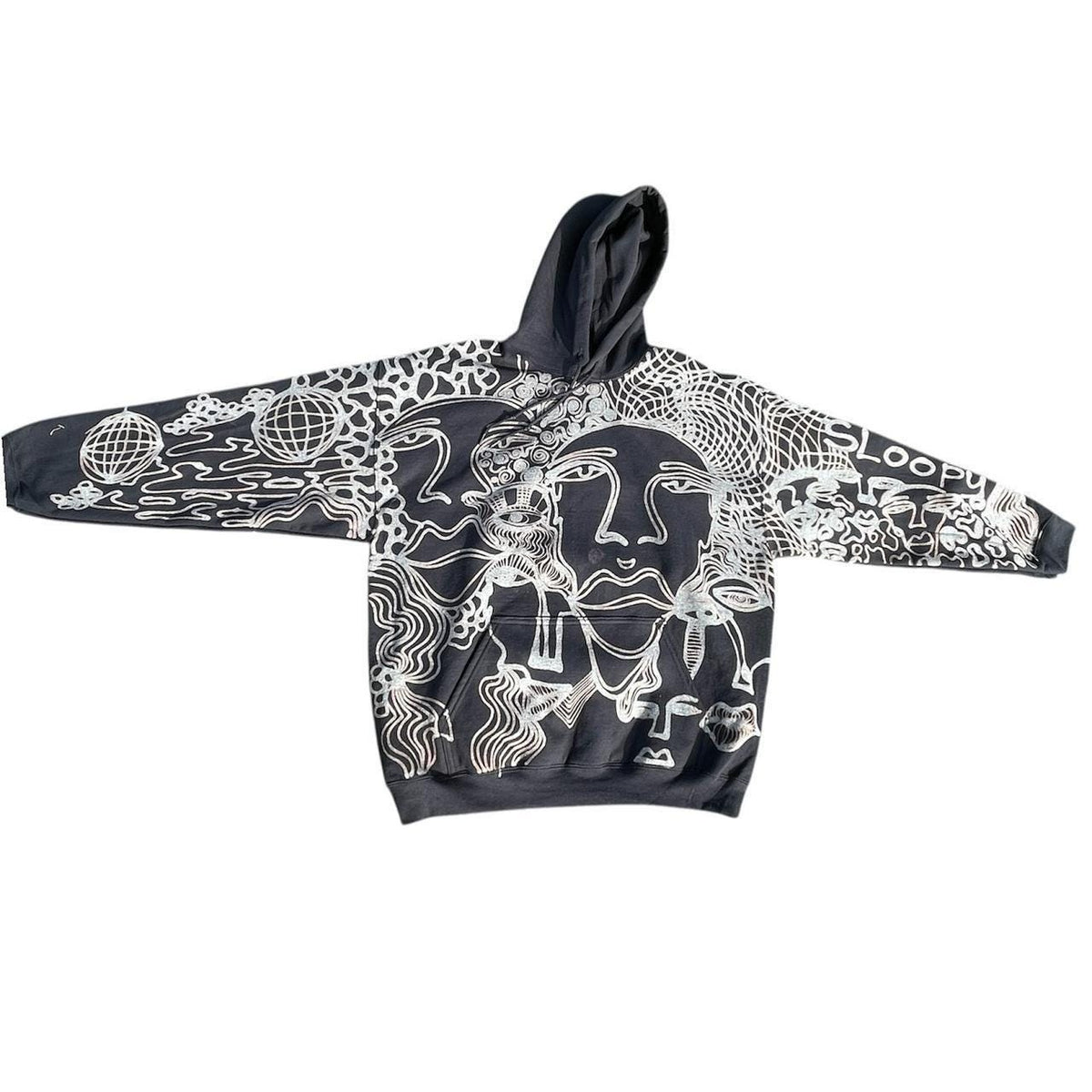 Graphic faces and trippy geometric patterned hoodie