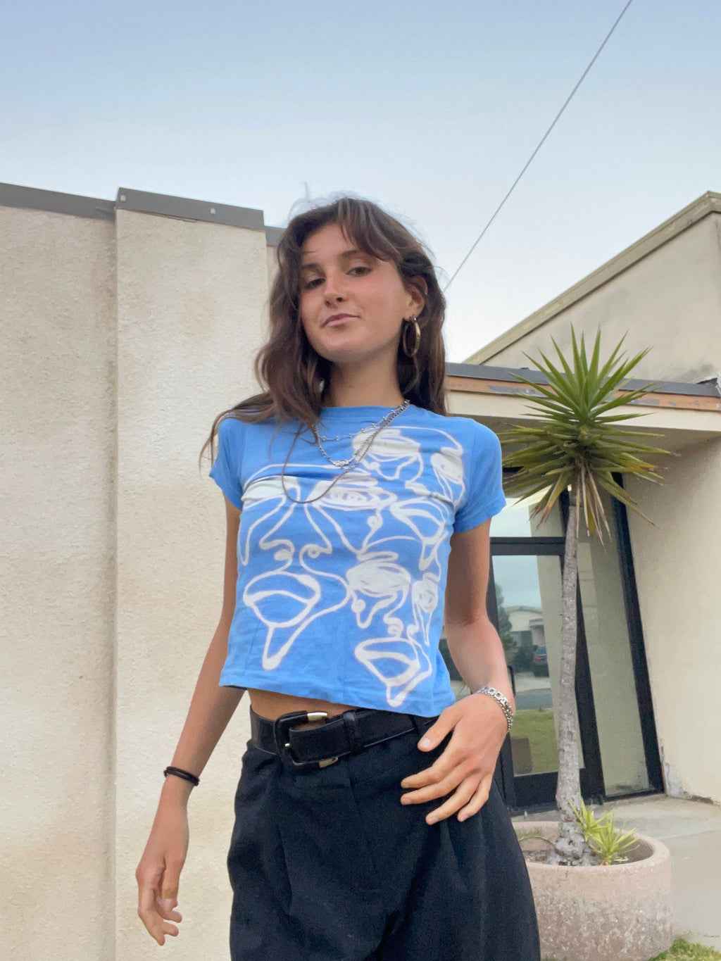 Various faces baby tees