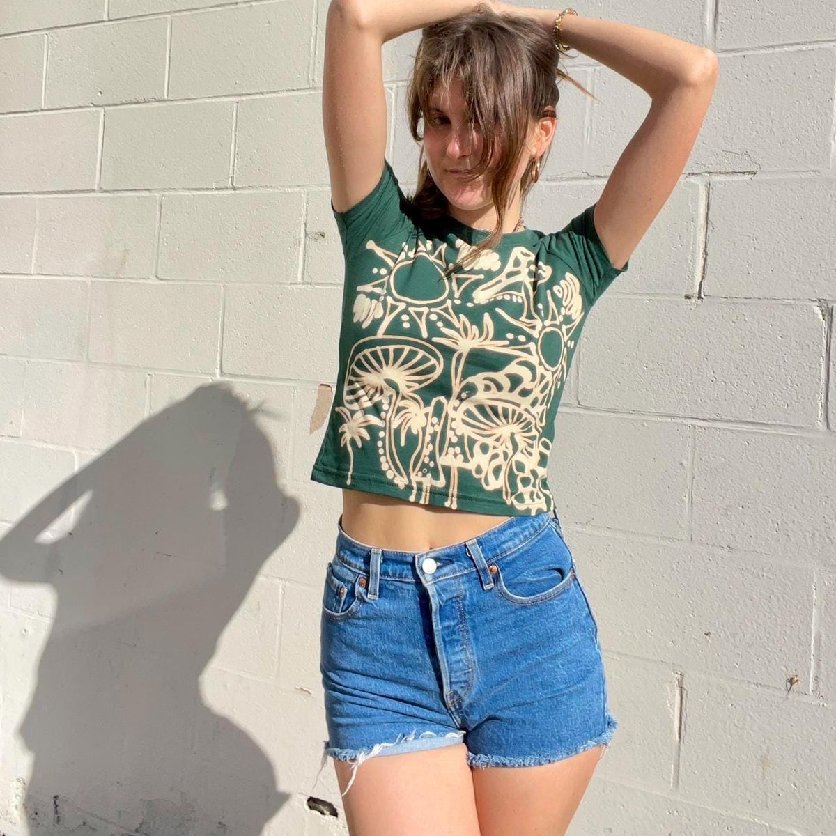 Mushrooms and sunshine celestial garden baby tee