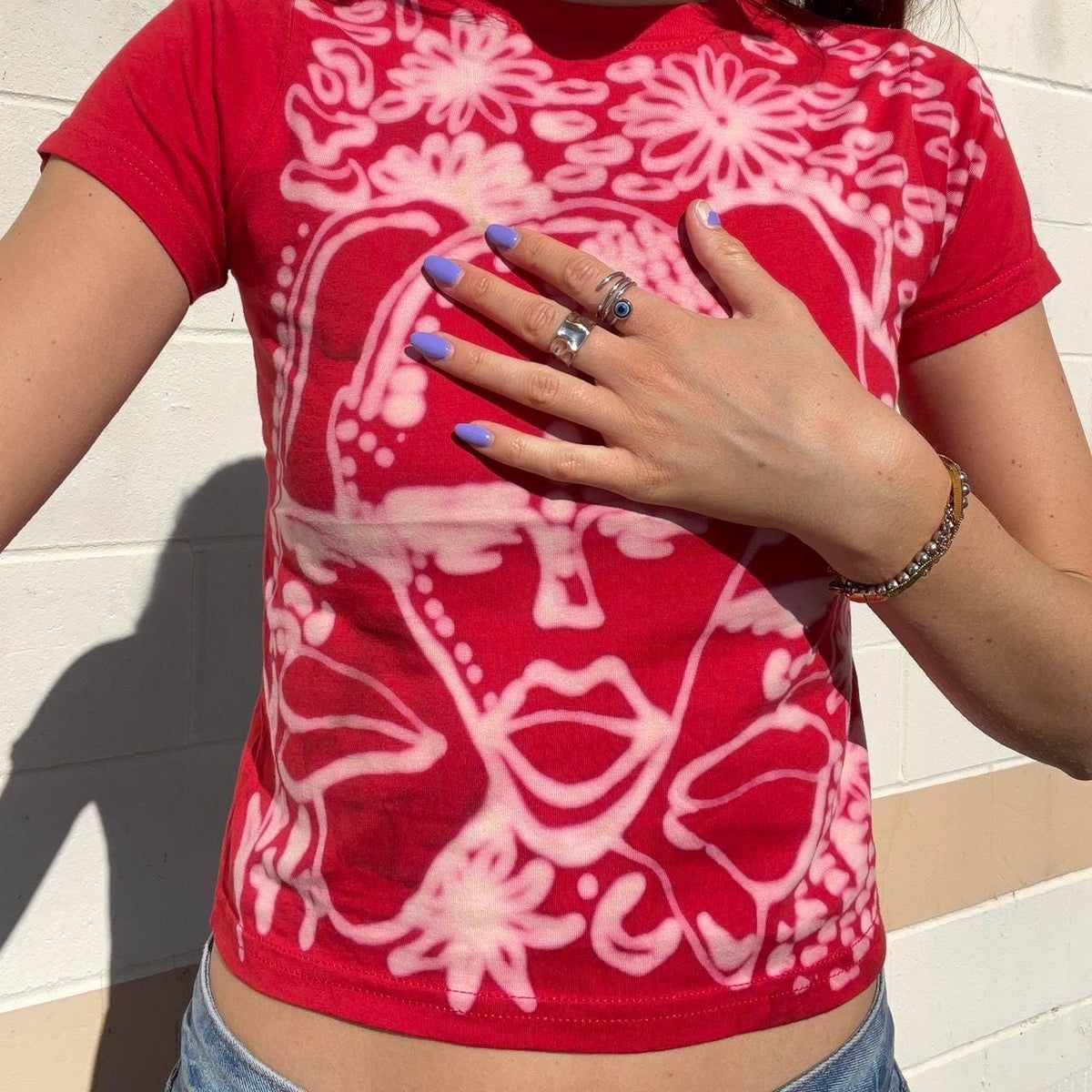 Garden faces cherry red baby tee