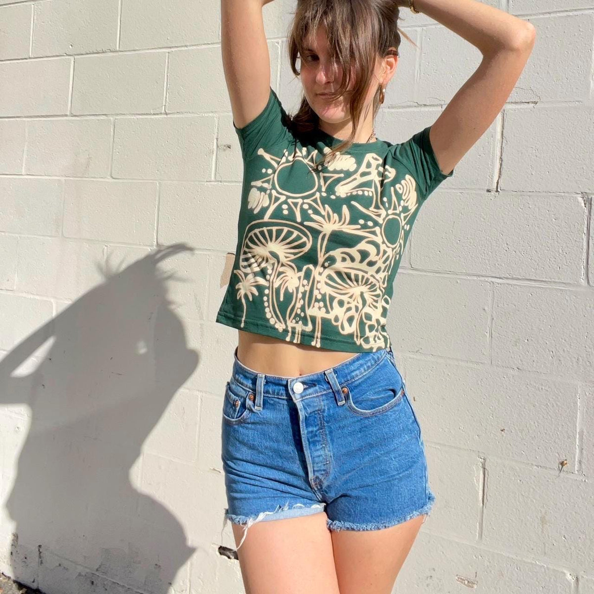 Mushrooms and sunshine celestial garden baby tee