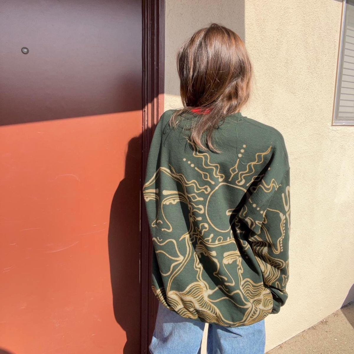 Funky faces and disco crewneck sweatshirt