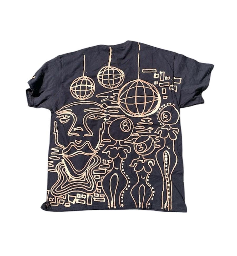 Funky festival faces graphic tee