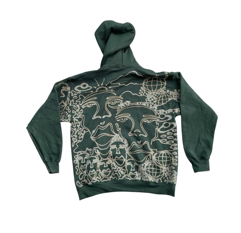 Abstract faces, spiral geometric pattern, and celestial sun print style hoodie in golden tan/yellow and white/ cream